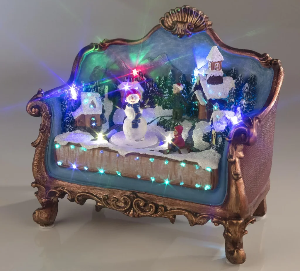 Sofa mit weihnachtlicher Szene mit Beleuchtung und Musik