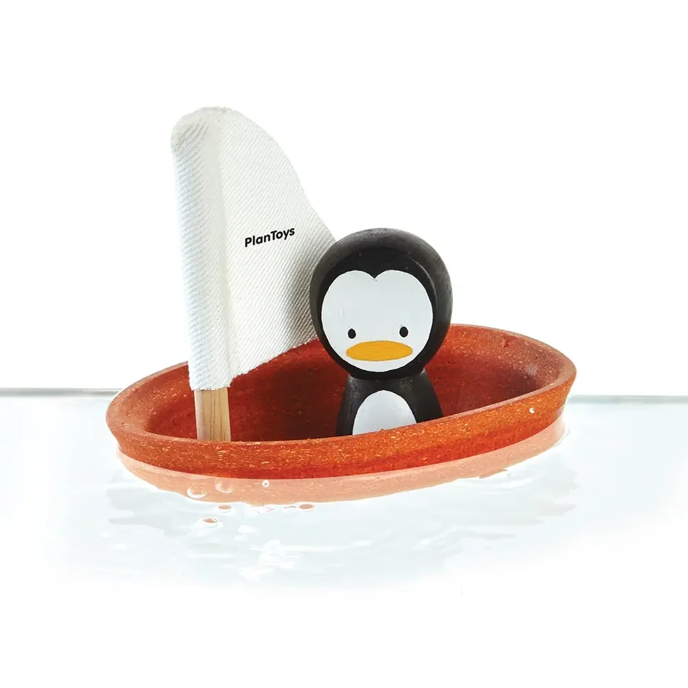 Plan Toys Badewannen-Boot orange Pinguin